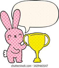 cute cartoon rabbit with sports trophy cup with speech bubble in comic book style
