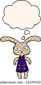 cute cartoon rabbit with thought bubble in comic book style