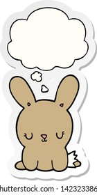 cute cartoon rabbit with thought bubble as a printed sticker