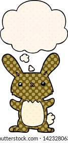 cute cartoon rabbit with thought bubble in comic book style