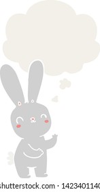 cute cartoon rabbit with thought bubble in retro style