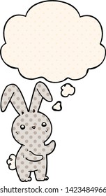 cute cartoon rabbit with thought bubble in comic book style