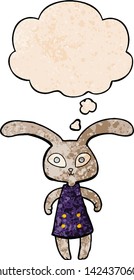 bonito conejo de dibujos animados con burbuja de pensamiento en estilo de textura gruesa