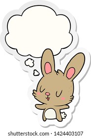 cute cartoon rabbit with thought bubble as a printed sticker