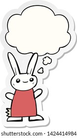 cute cartoon rabbit with thought bubble as a printed sticker