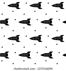Cute cartoon space pattern with hand drawn rockets and stars. Sweet vector black and white space pattern. Seamless monochrome doodle space pattern for textile, wallpapers, wrapping paper and web.