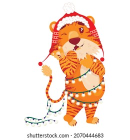 Cute cartoon striped red tiger. A tiger in a Christmas hat and a garland winks and flirts. Printing of children's t-shirts, cards, posters. Hand drawn vector stock illustration isolated on white.
