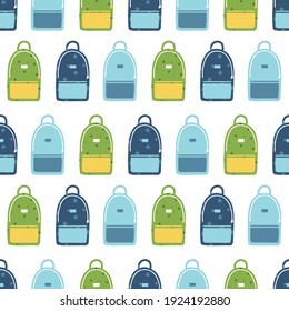 Cute cartoon style green and blue school bags vector seamless pattern background. Back to school design.
