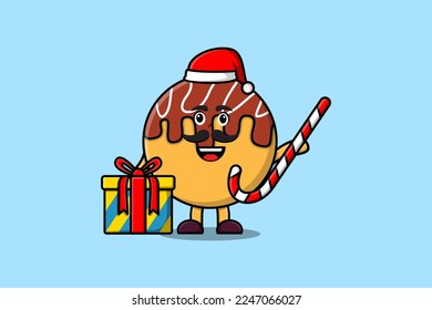 cute cartoon Takoyaki santa clause character is bringing candy cane and boxes christmas