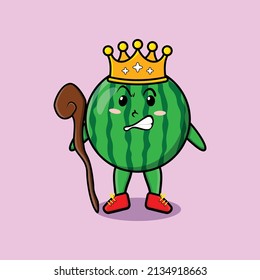 Cute cartoon watermelon mascot as wise king with golden crown and wooden stick