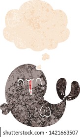 cute cartoon whale with thought bubble in grunge distressed retro textured style