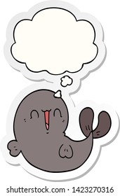 cute cartoon whale with thought bubble as a printed sticker