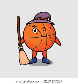 Cute cartoon witch shaped basketball character with hat and broomstick