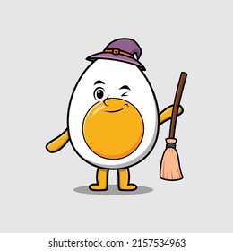 Cute cartoon witch shaped boiled egg character with hat and broomstick