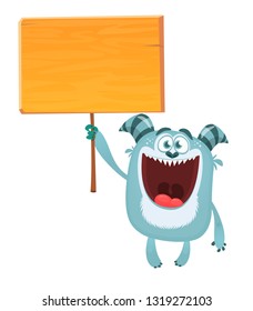 Cute cartoon yeti monster holding empty placard