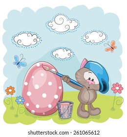 Cute Cat with brush is colored an egg 