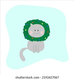 cute cat with a Christmas tree wreath on his head
