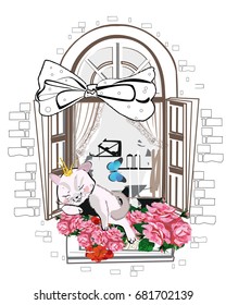 Cute cat with a crown in the window with flowers.
