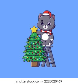 lindo gato decorando el árbol de navidad