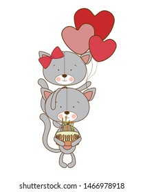 cute cat with helium balloons on white background