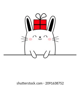 Un gato lindo sosteniendo patas. Caja de regalo roja. Feliz Navidad Feliz Año Nuevo. Divertido animal de garabato kawaii. Gatito de gatito de línea. Caricatura graciosa de bebé personaje de mascota. Diseño plano. Fondo blanco. Ilustración del vector