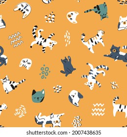 Cute cat kitten seamless pattern on yellow background. Funny animals are happy, relaxed in blue, yellow, green colors