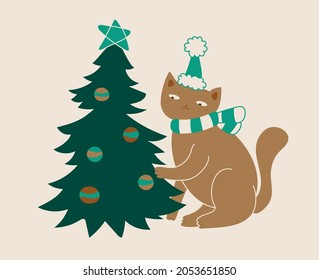 
cute cat playing with christmas tree