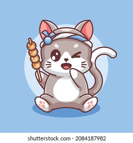 Cute cat wearing a Japanese headband and bringing takoyaki