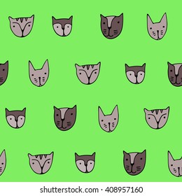 Cute Cats faces. Cartoon vector seamless pattern.