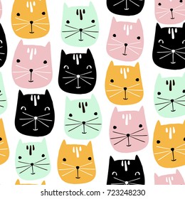 Cute cats faces seamless pattern. Vector childish background