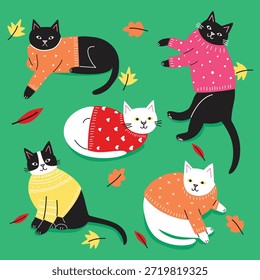 Gatos bonitos em camisolas. Conjunto de Ilustrações de Vetor de outono. Gatinhos Engraçados Brincando com Folhas Caindo.