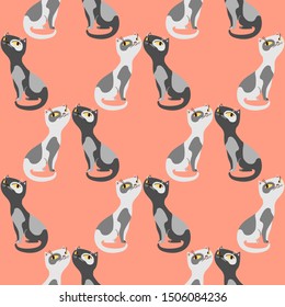 Cute cats vector seamless pattern. Peachy background.