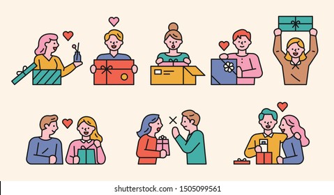 Cute characters opening the gift box. flat design style minimal vector illustration.