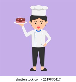 cute chef showing delicious chocolate cake