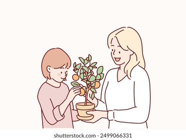 Cute child girl helping her mother to care for plants. Hand drawn style vector design illustrations.