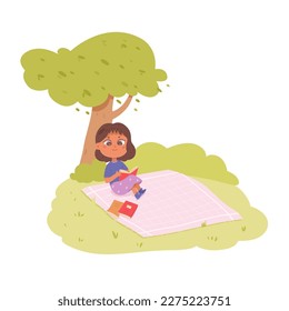 Cute child reading library book vector illustration. Cartoon young school student studying, girl sitting on blanket under tree of forest or park, holding open book with story or fairy tale to read