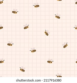 Cute childish seamless pattern with bees on a checkered background. Cartoon vector illustration. Nursery Print for textiles and paper.