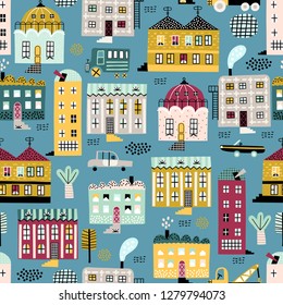 Cute childish seamless pattern with old buildings and cars. Good for kids fabric, textile, nursery wallpaper. Seamless city landscape. Kids pattern.