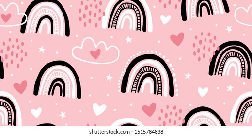 Cute childish seamless pattern with sky, clouds, rainbows, hearts. Minimalistic scandinavian pattern design. Pink colors. Perfect for fabric, textile, wrapping for kids. Kids pattern