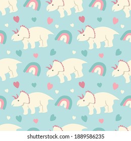 cute childish vector seamless pattern with hand drawn dinosaurs (triceratops) and rainbow in gentle colors. pattern for printing on fabric, clothing, wallpaper, wrapping paper, for nursery