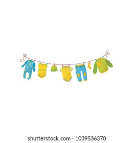 Cute children s garment hanging on rope. Baby romper, bodysuit, warm cap, stylish sweatpants, sock and jumper. Apparel for newborn boy or girl. Kids fashion. Flat vector