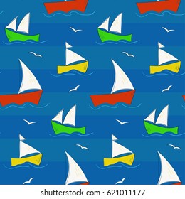 Cute childrens seamless hand drawn sailing-ship pattern with colorful ships. Nice sea life kids texture for textile, wrapping paper, wallpaper, swimming cloth