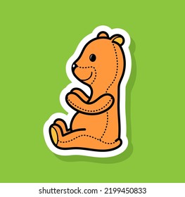 Cute children's teddy bear on a green background. Cool sticker.	