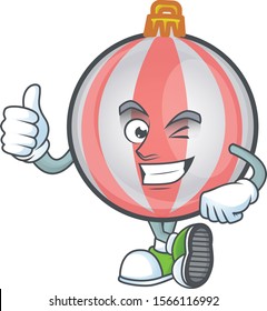 Cute christmas ball cartoon with thumbs up mascot