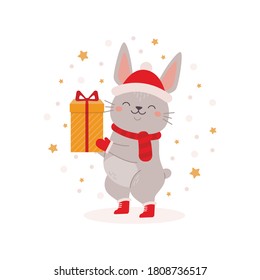 Cute christmas bunny giving a gift.
Funny christmas character for design, print, postcards, posters.
Flat cartoon vector illustration on white background 