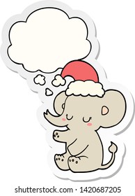 cute christmas elephant with thought bubble as a printed sticker