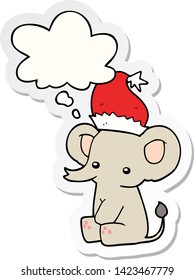 adorable elefante de navidad con burbuja de pensamiento como pegatina impresa
