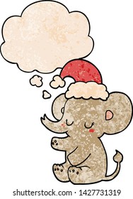 adorable elefante de navidad con burbuja de pensamiento al estilo de textura gruesa