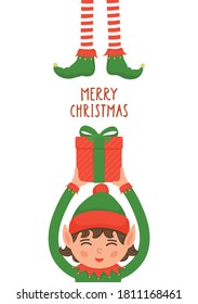 Cute Christmas elf holding gift isolated on white background. Handwritten greeting Merry Christmas. Funny Santa's helper. 