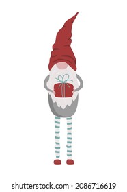 Cute Christmas gnome with long legs holding a gift box. Vector hand drawn illustration isolated on white. Xmas Elf in Scandinavian style.